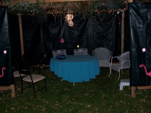 Our 2006 sukkah with lights and pink flamingos..
